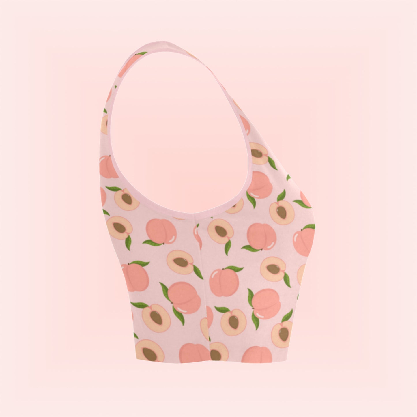 peach pink croptop displayed on coloured background