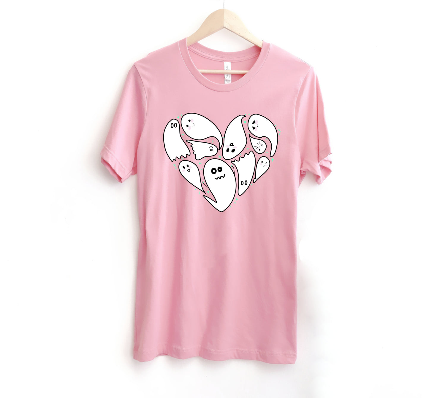Pink t-shirt with Halloween ghost design on a white background
