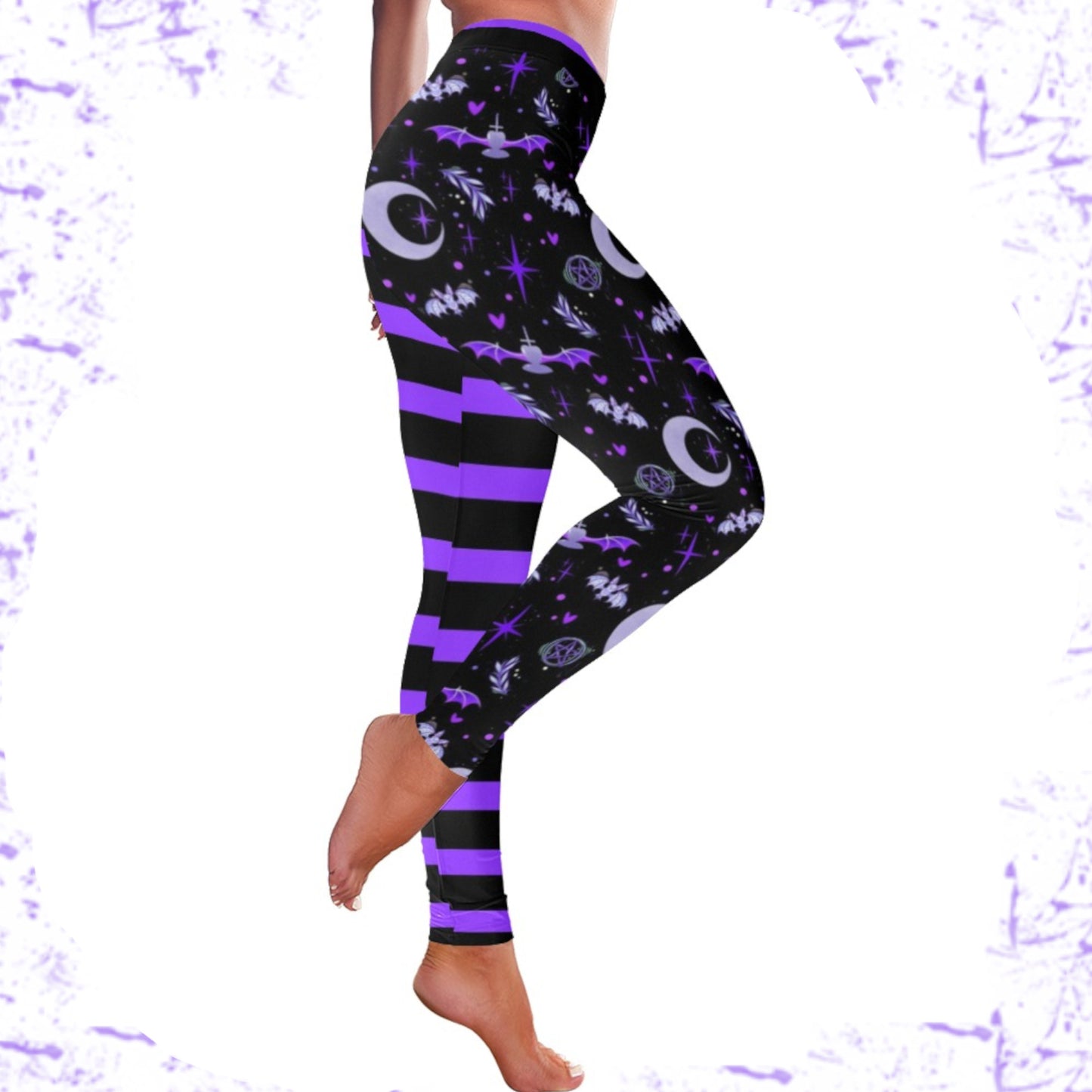 Purple and black pastel goth bat leggings displayed on clean white background.