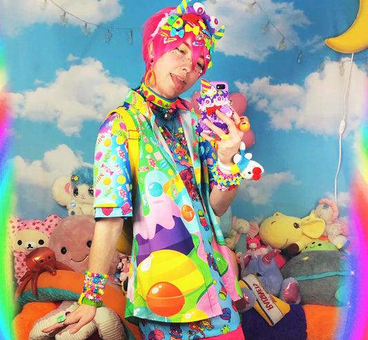 Youthful model wearing a cute harajuku shirt with candyworld print