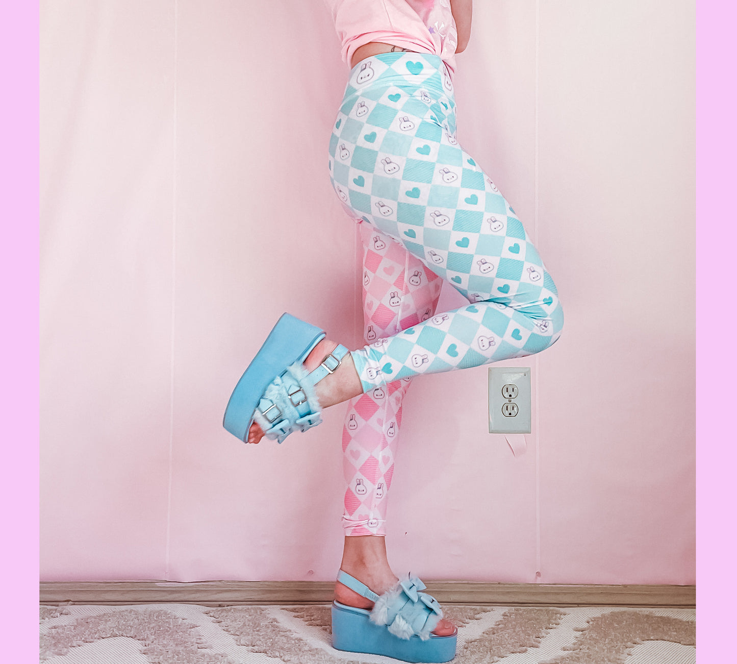 Youthful model wearing cute bunny kawaii leggings in pastel colours