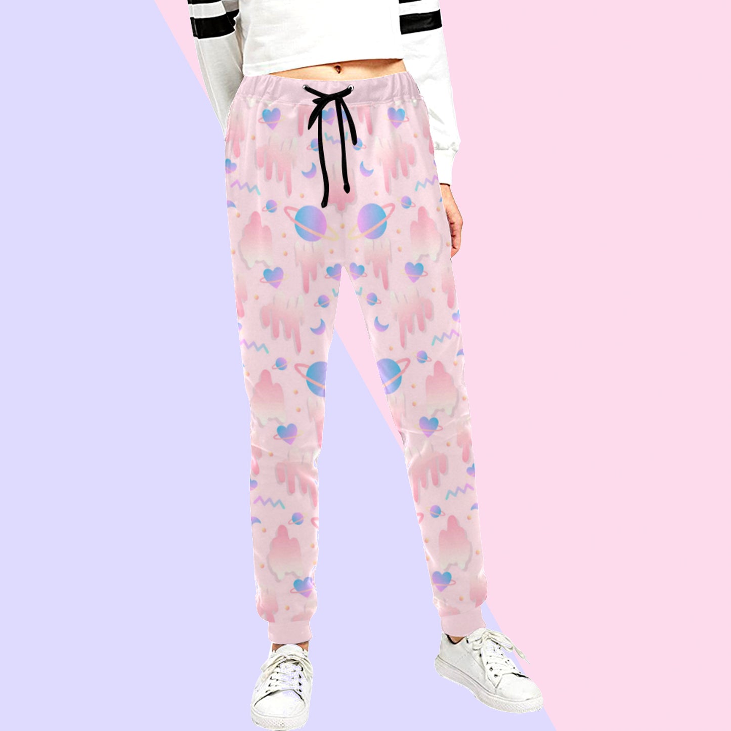 Pink pastel jogger displayed on pastel background.