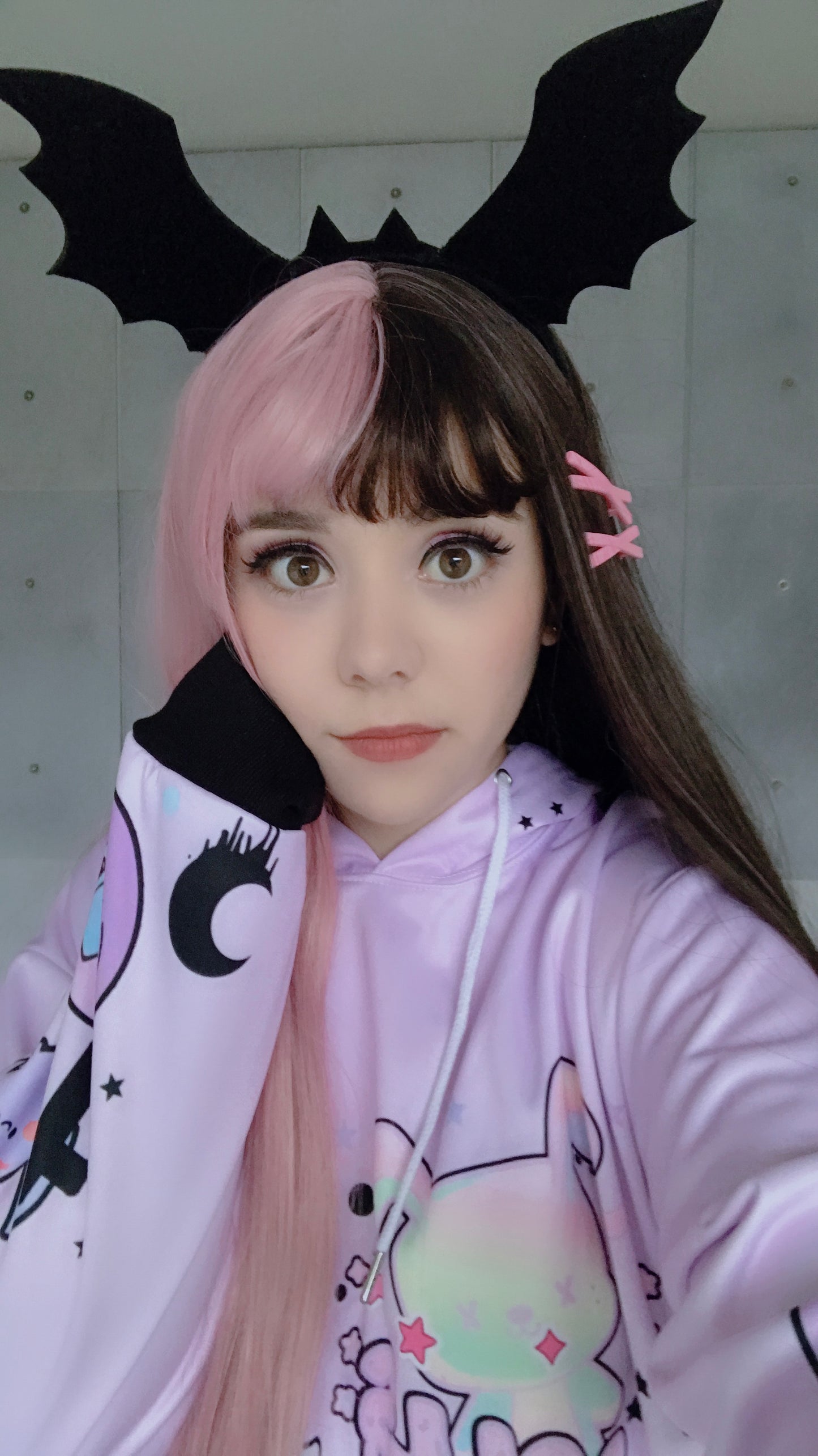 young model wearing a pastel goth Harajuku creepy cute bunny Halloween dress