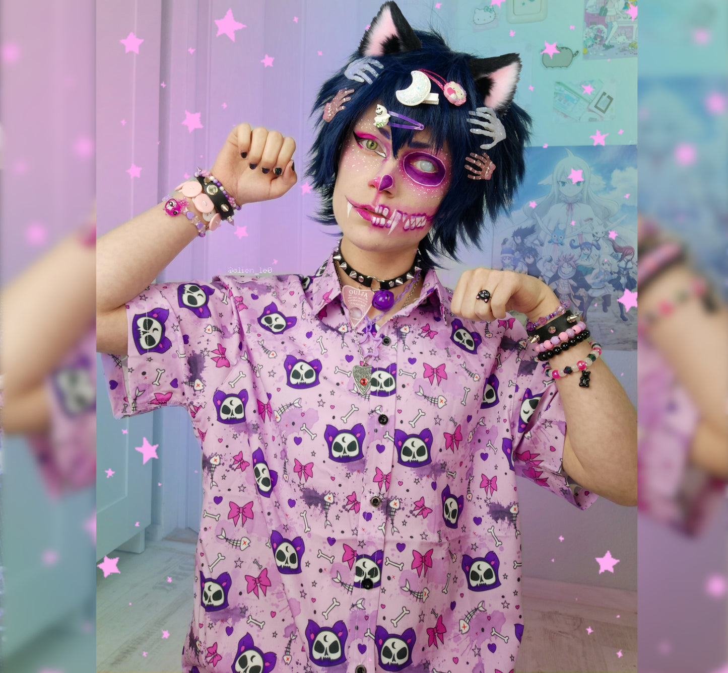 Model wearing a pastel goth button up shirt with cute cat designs.