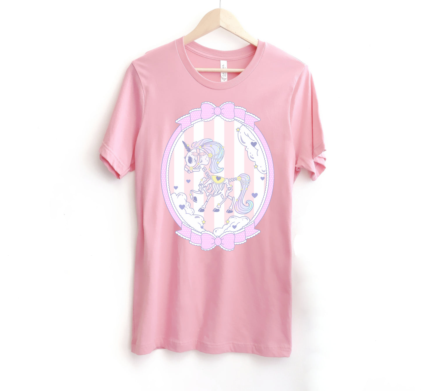 Pink pastel goth t-shirt displayed on clean white background.