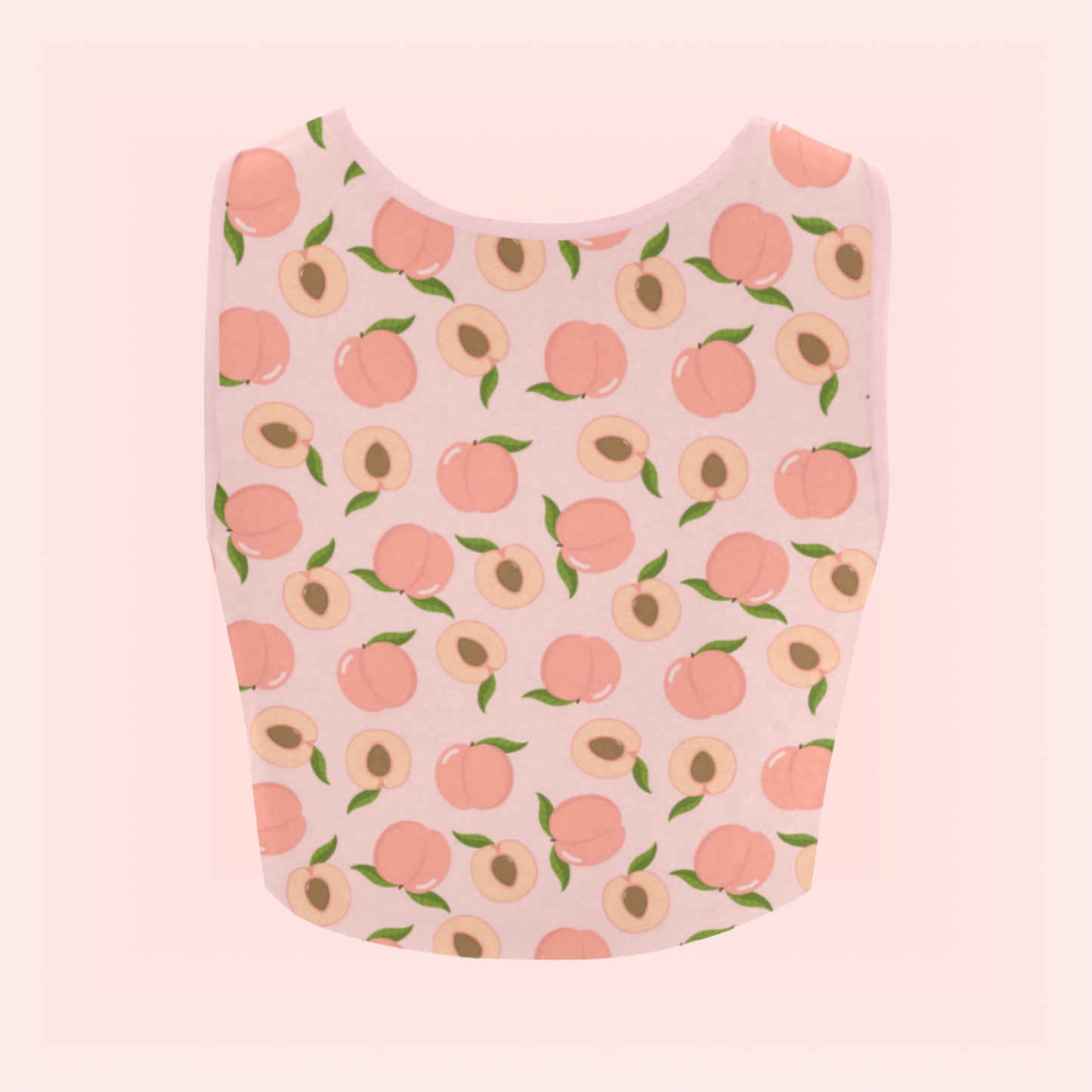 peach pink croptop displayed on coloured background