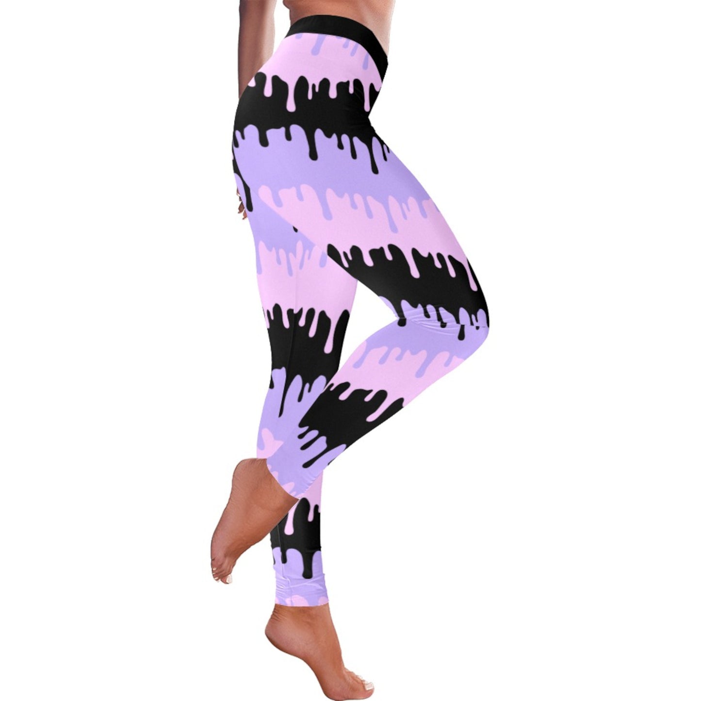 Pink and black pastel goth leggings displayed on clean white backgroundCute