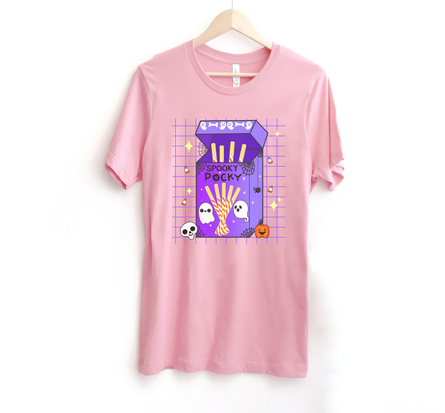 Pink t-shirt with a Halloween-themed design on a white background