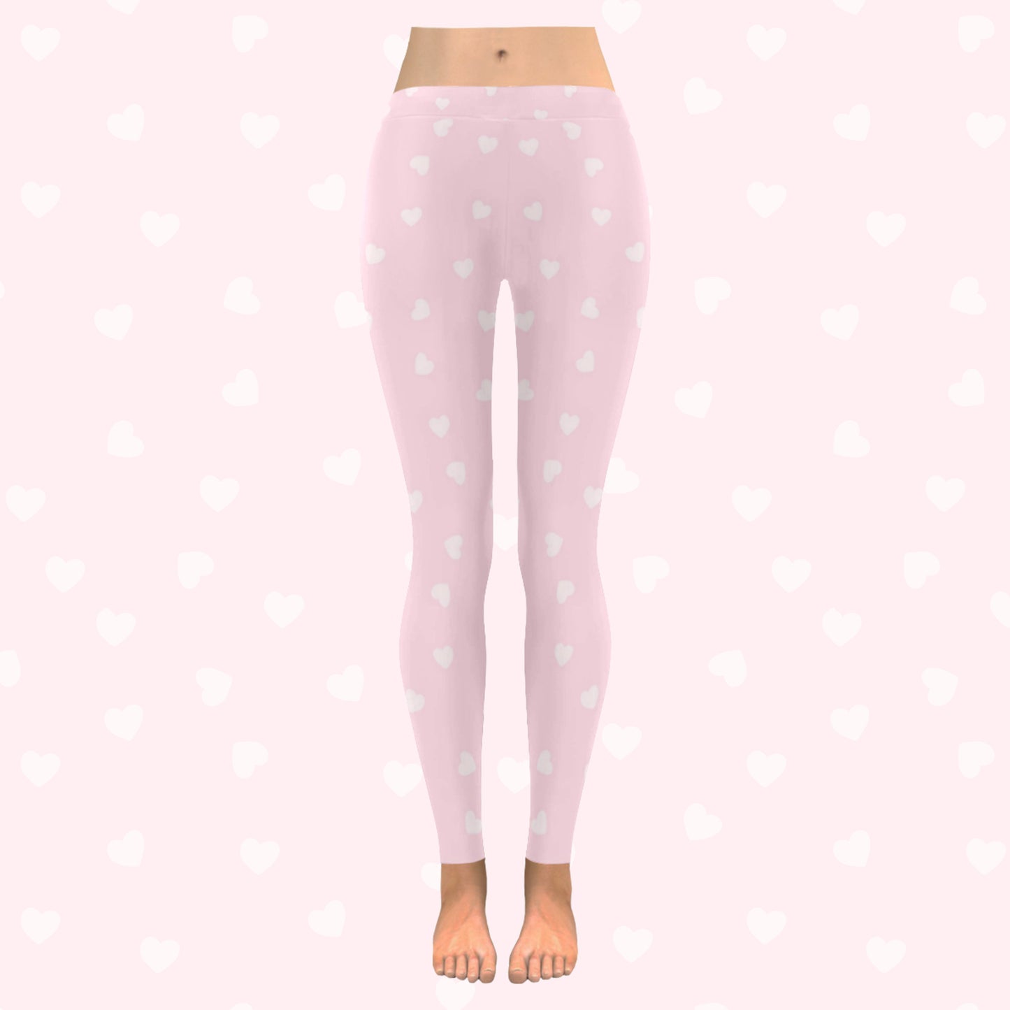 model wearing pink heart yume kawaii leggings on pink heart background