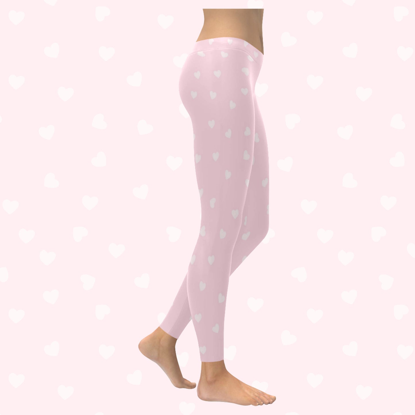model wearing pink heart yume kawaii leggings on pink heart background