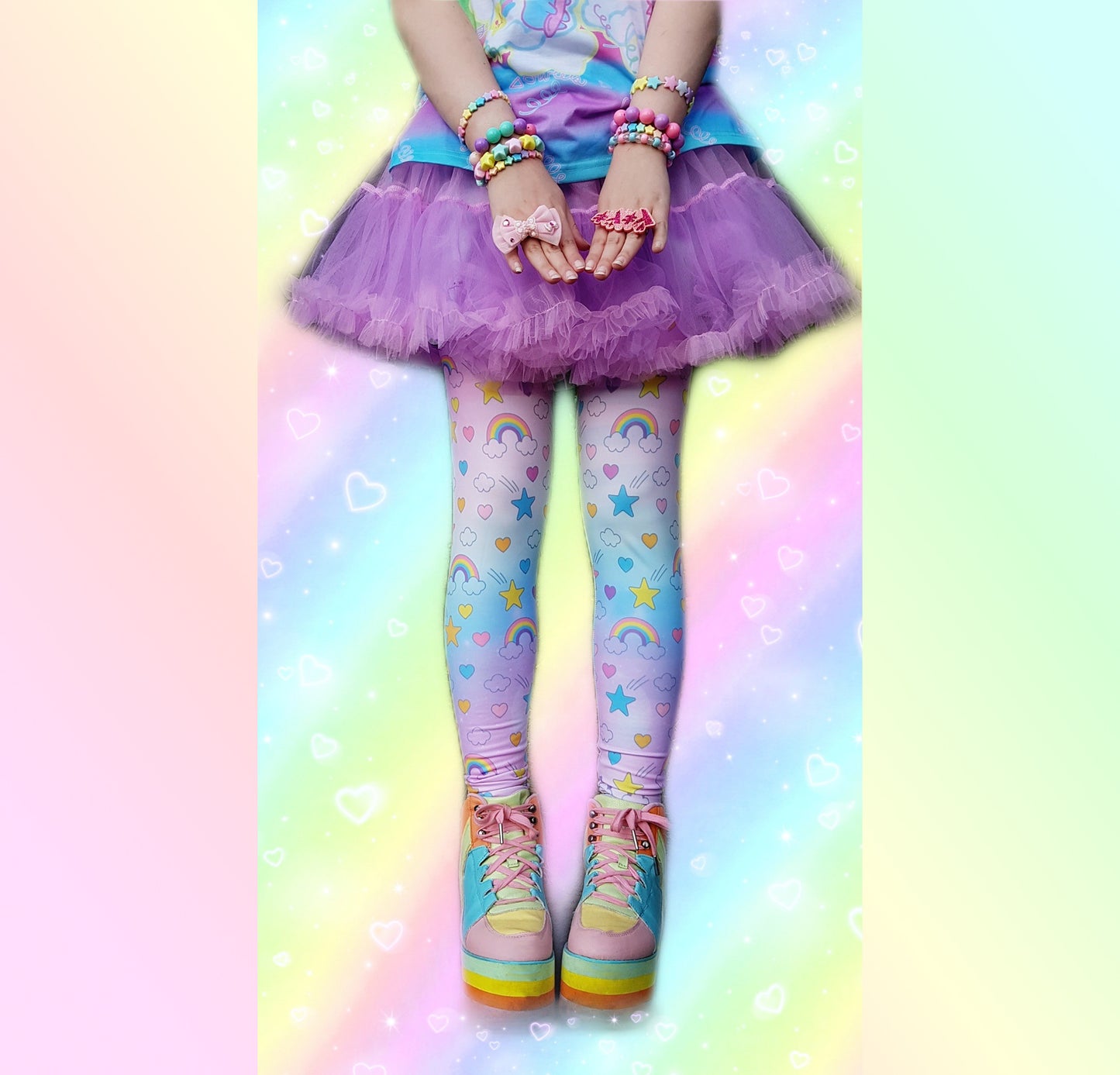 model wearing cute rainbow stars kawaii leggings in pastel colours