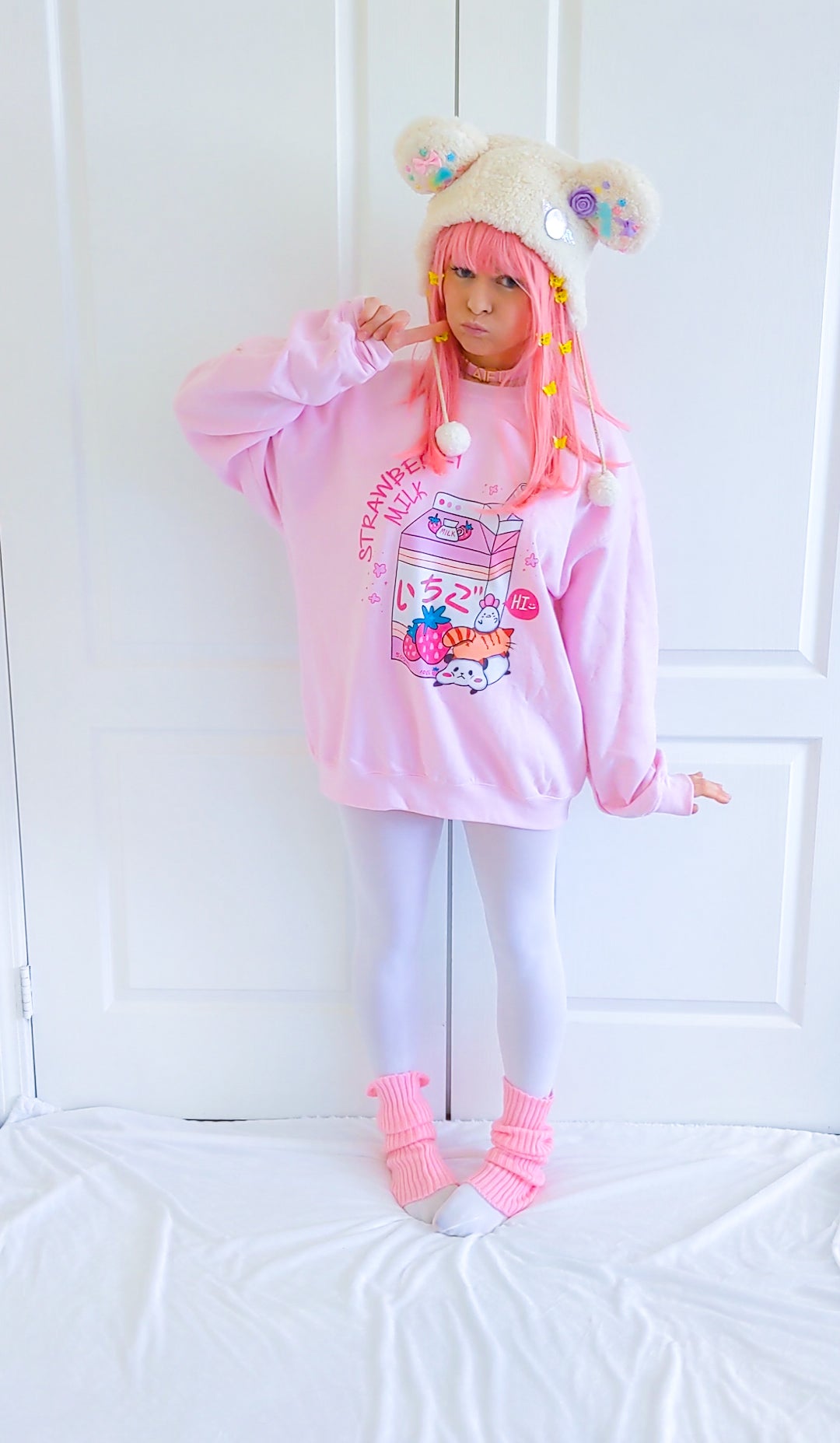 Cute girl modeling a kawaii aesthetic sweatshirt