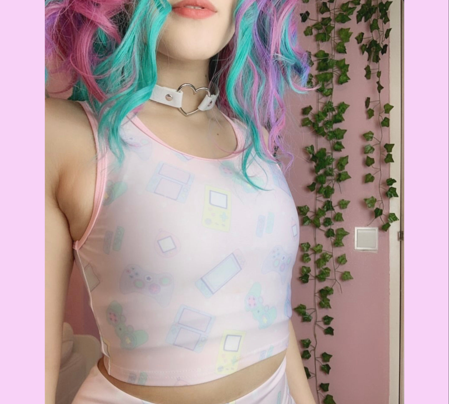 Youthful model wearing a cute kawaii crop top with pastel accessories