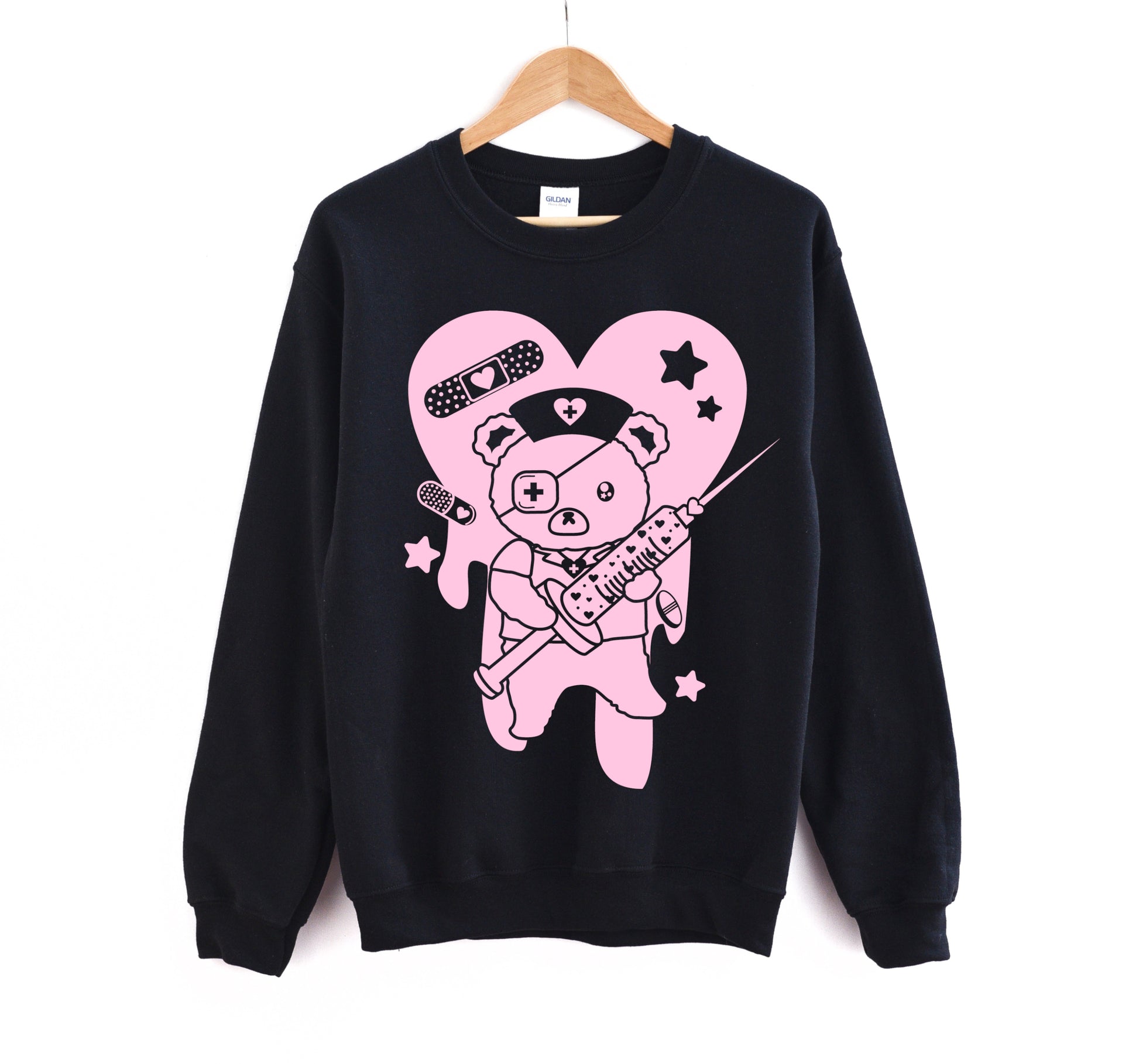Black Menhera Kei Bear Band Aid kawaii aesthetic sweatshirt displayed on clean background.