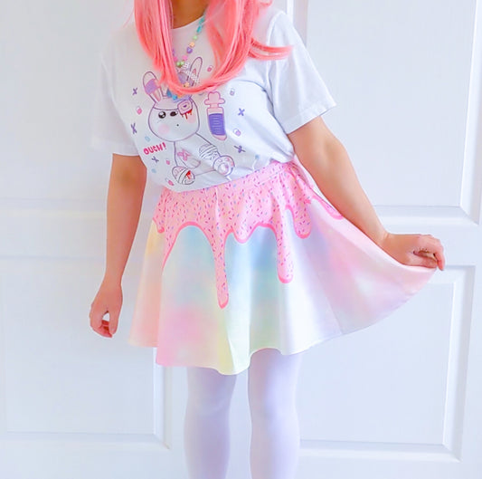 Happy girl dressed in a kawaii Donuts Sugar skater skirt styled 
