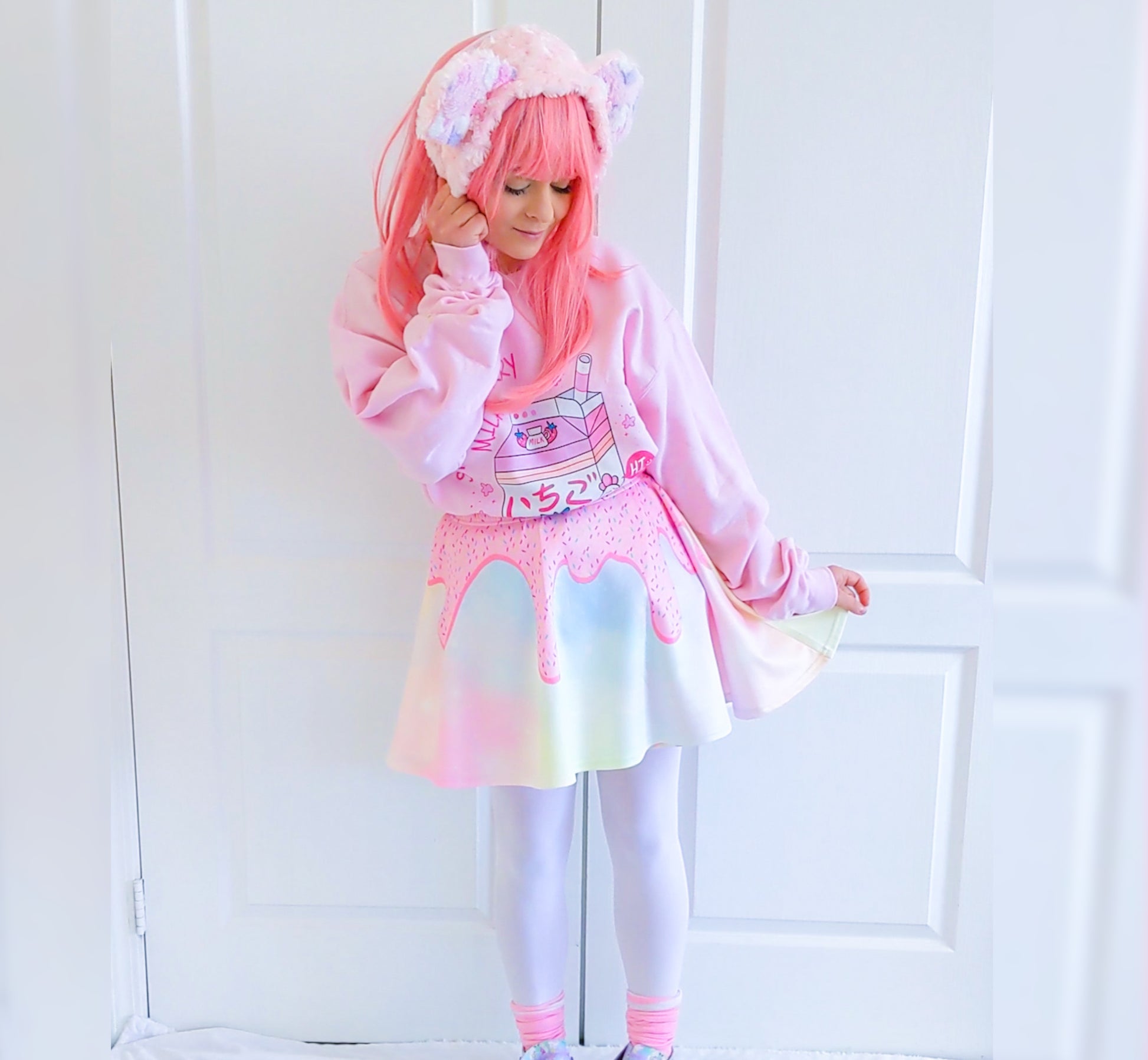 Happy girl dressed in a kawaii Donuts Sugar skater skirt styled 