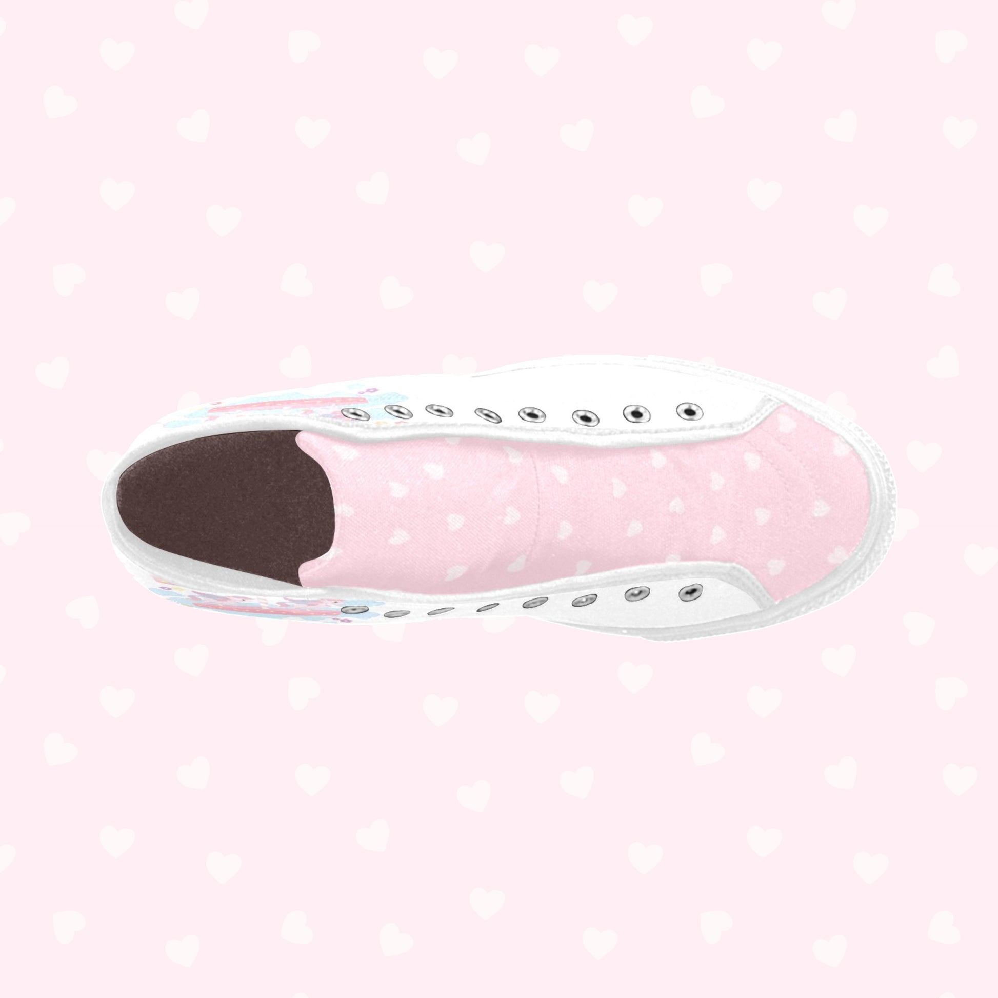 Close-up of cute pastel-colored shoes with decorative elements, displayed on a pink heart background