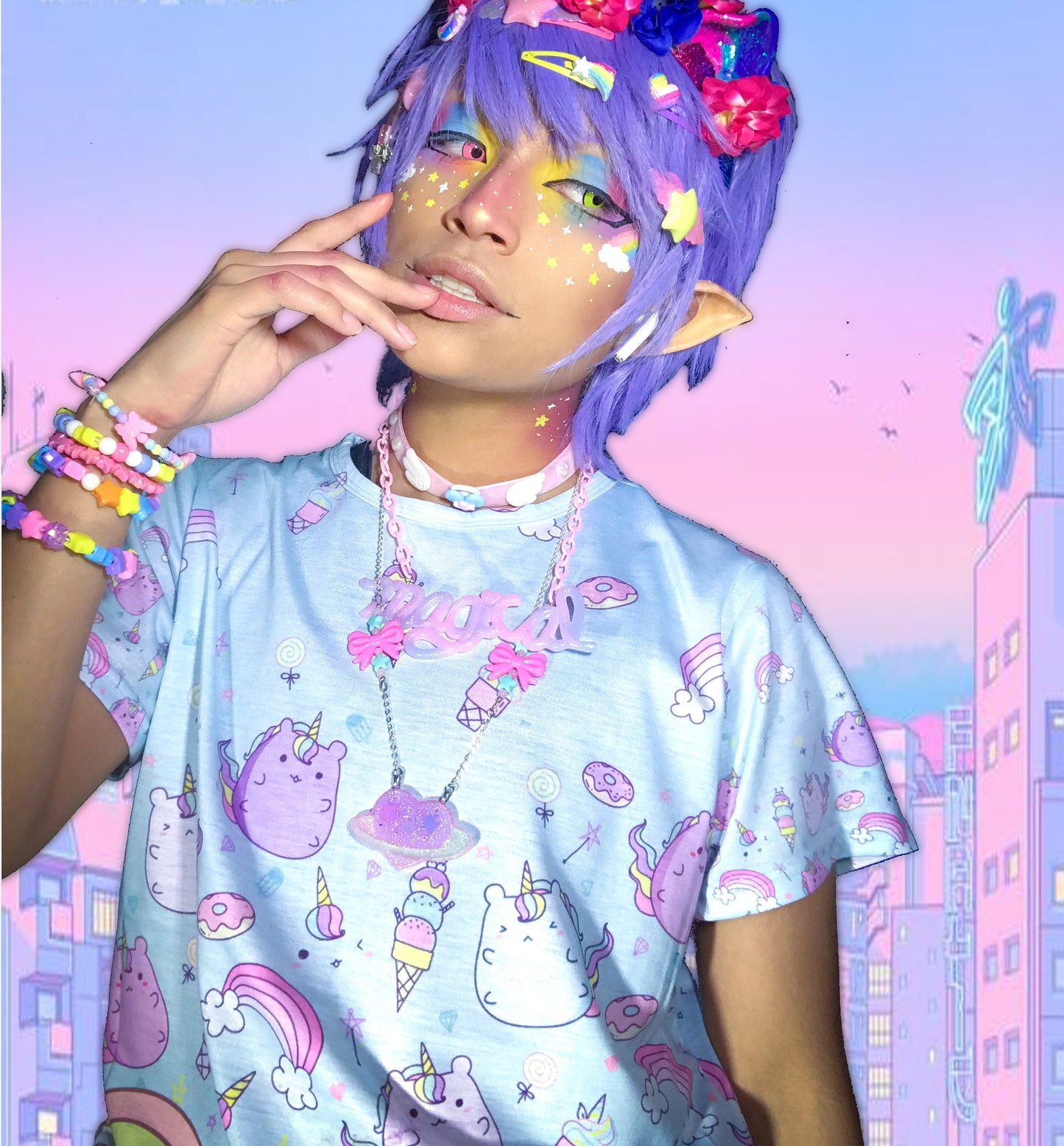 model  wearing a pastel kawaii t-shirt with a cute rainbow clouds print