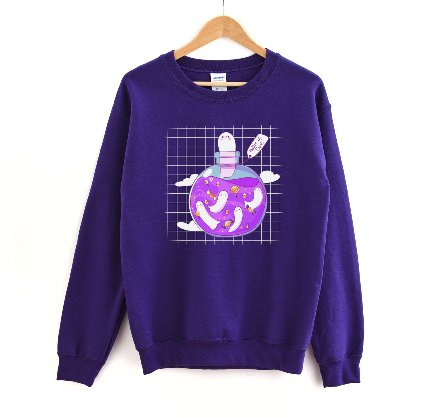 Kawaii Halloween sweatshirt with Halloween-themed graphics of a bottle of boos on a white background.