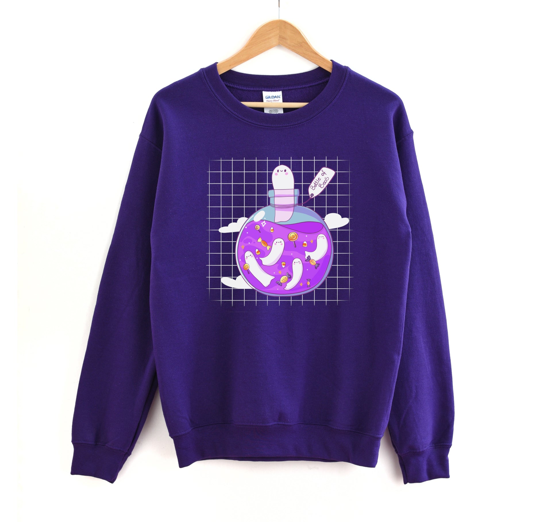 Kawaii Halloween sweatshirt with Halloween-themed graphics of a bottle of boos on a white background.