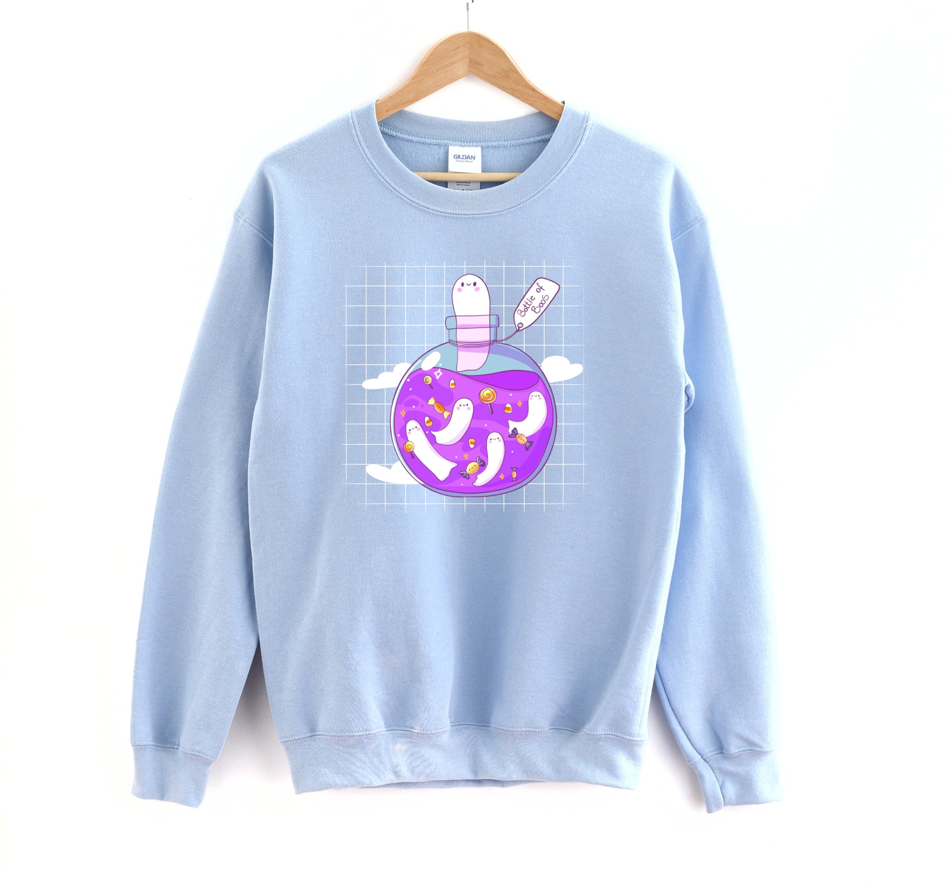 Light blue Halloween sweatshirt with a colorful graphic on a white background