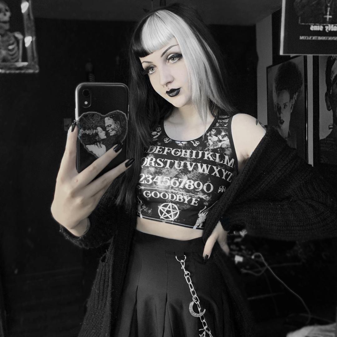 Youth model wearing Gothic crop top featuring Ouija board design, perfect for Nu Goth and Halloween outfits
