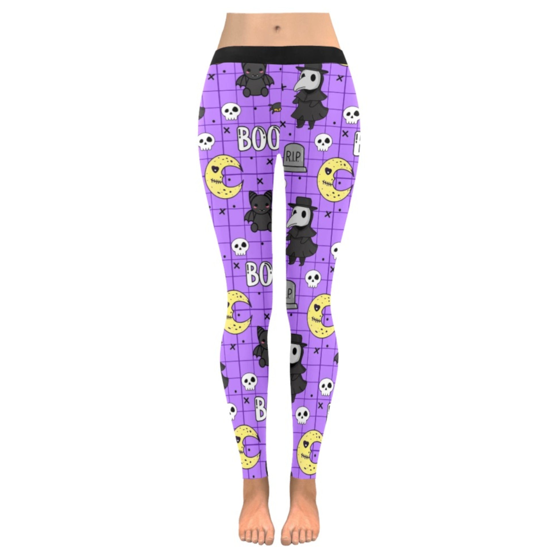 Purple leggings with Halloween-themed design on a white background
