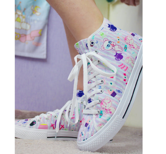 Young girl wearing stylish, cute shoes with a playful design