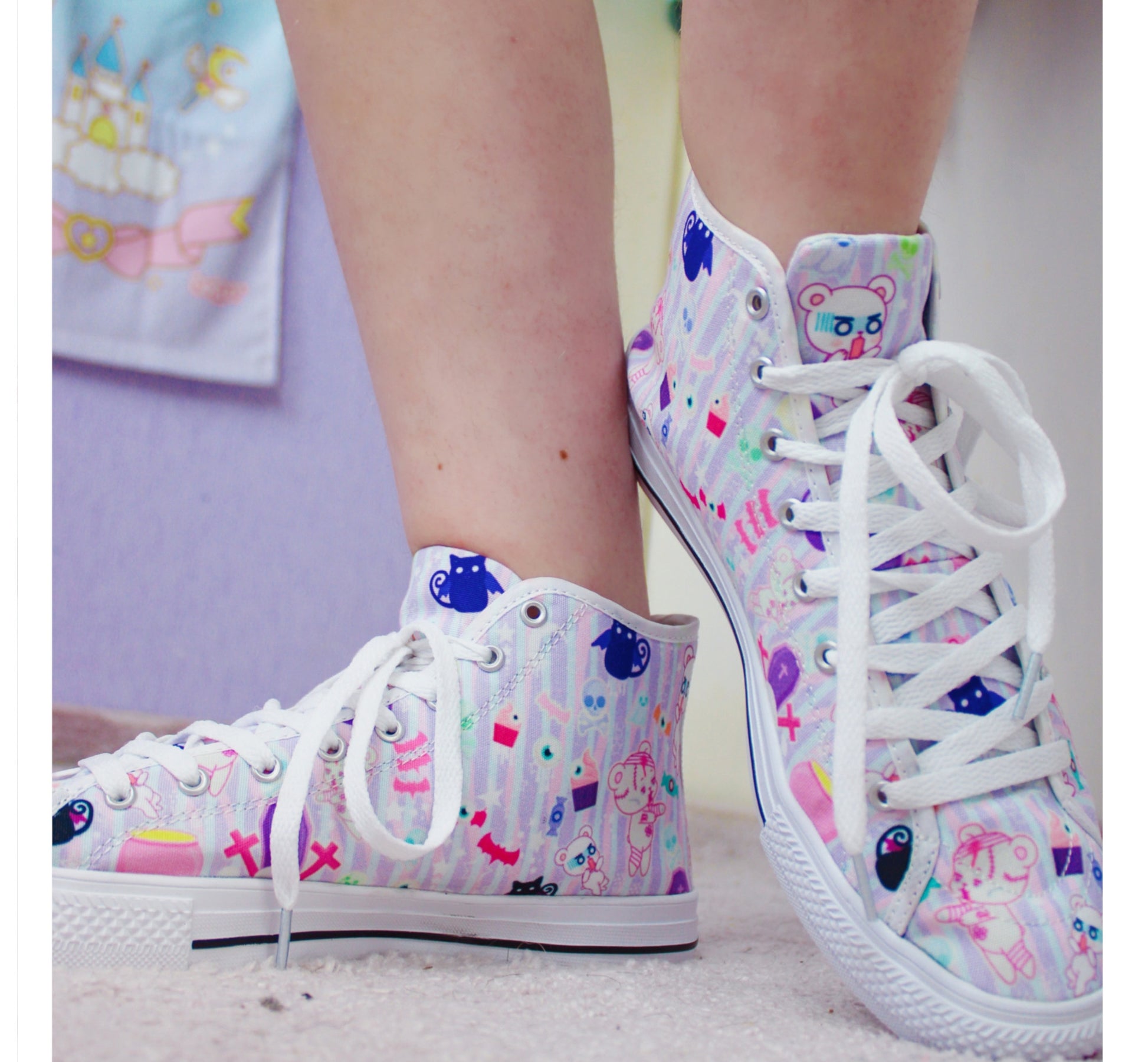 Young girl wearing stylish, cute shoes with a playful design