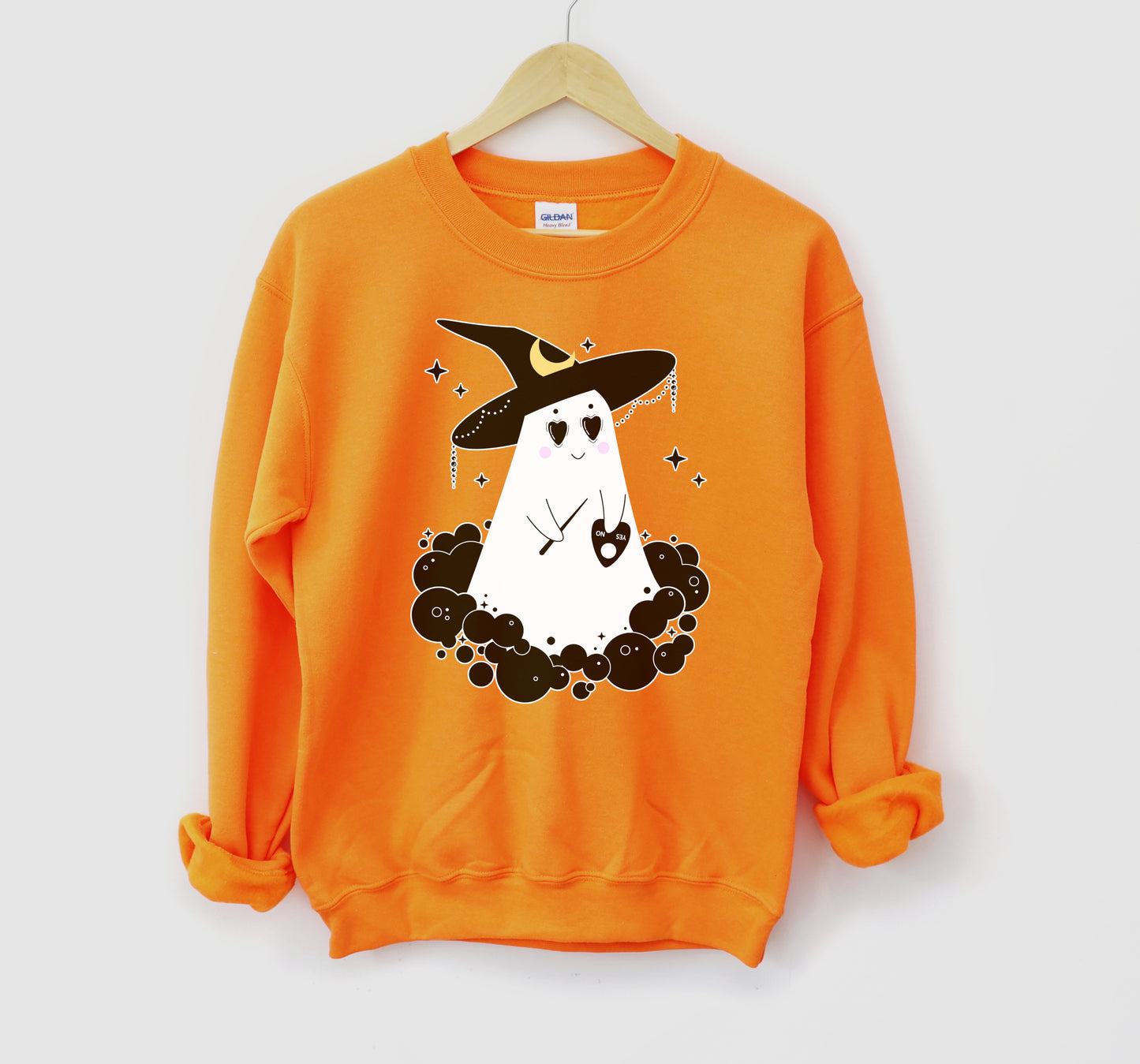 Orange Halloween kawaii sweatshirt displayed on clean white background