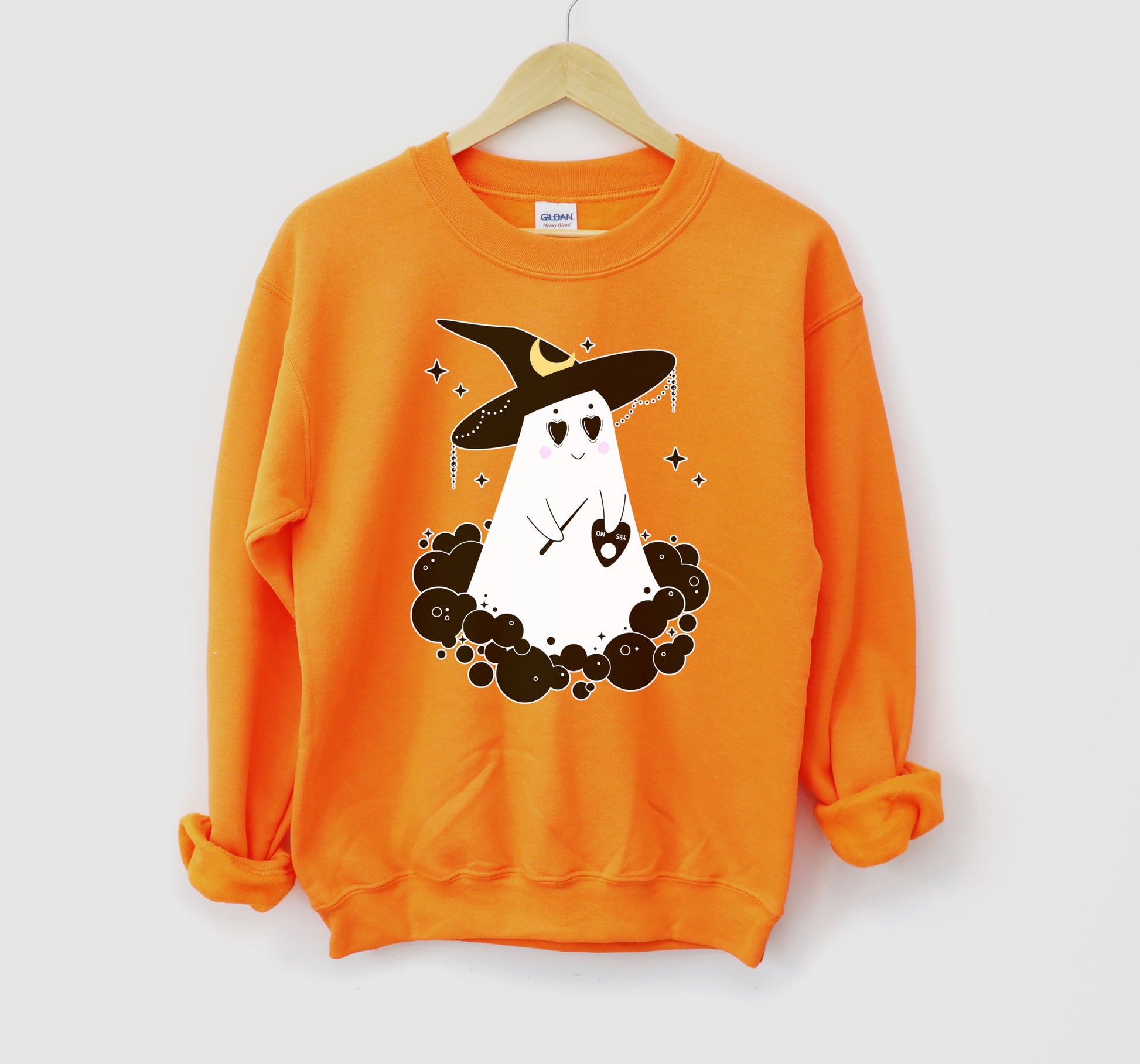 Orange Halloween kawaii sweatshirt displayed on clean white background