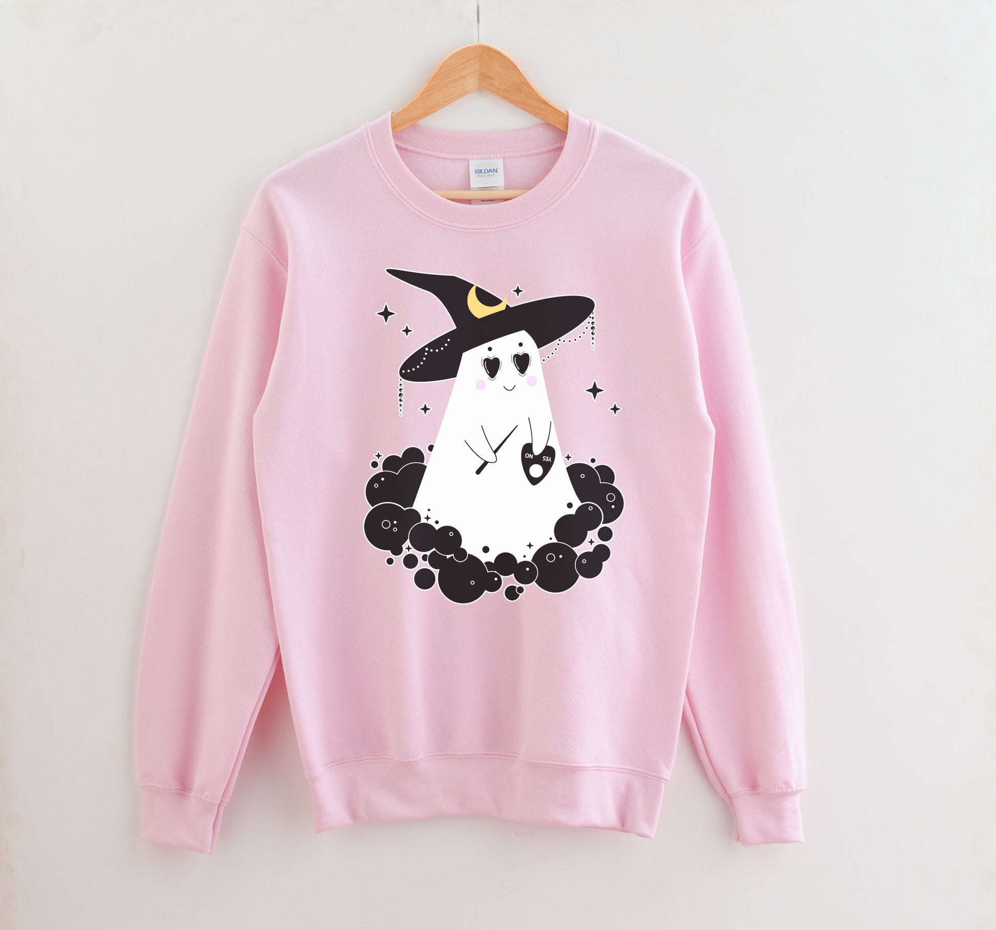 Pink Halloween kawaii sweatshirt displayed on clean white background