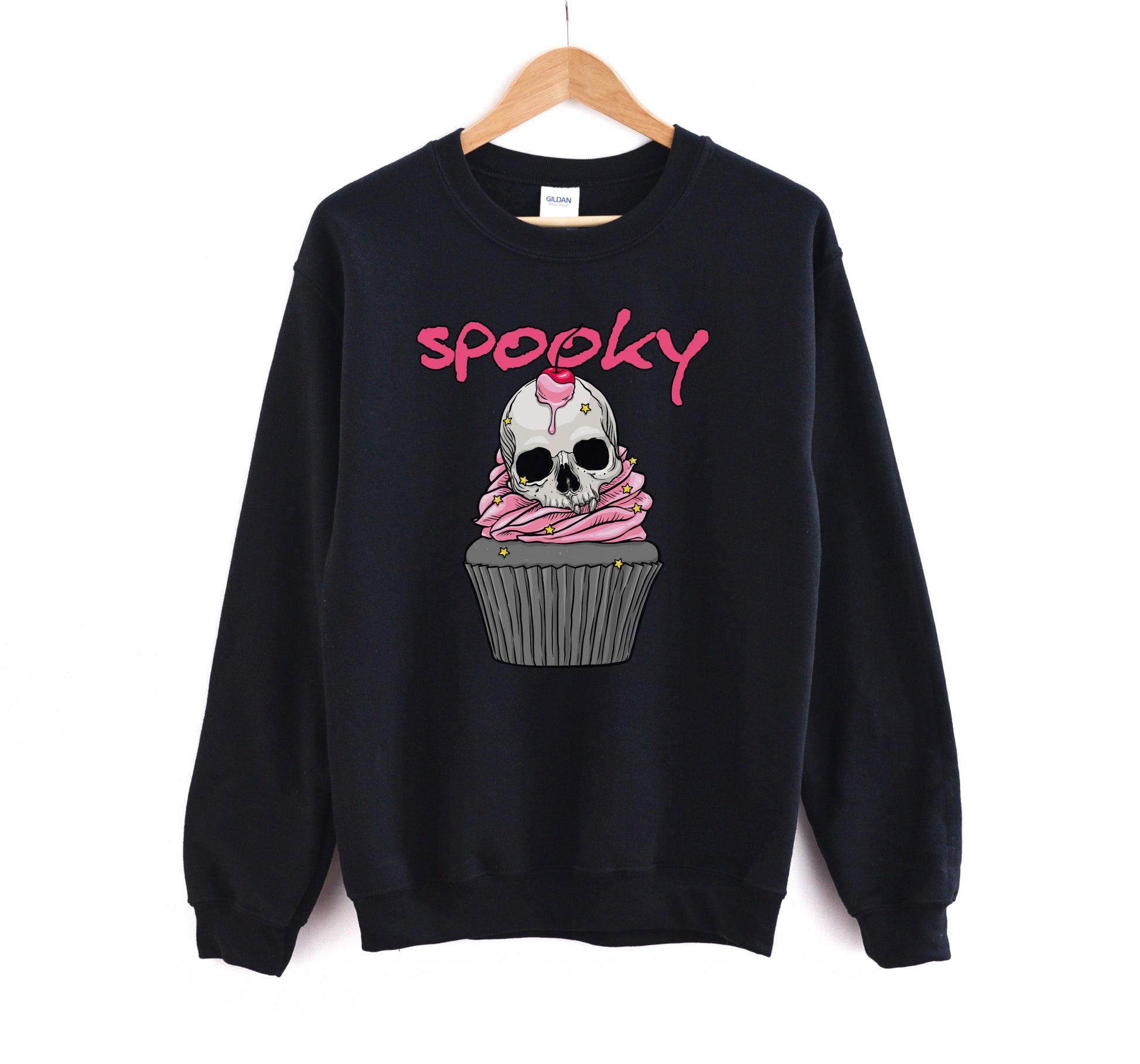 Black sweatshirt with a skull design and 'spooky' text on a white background