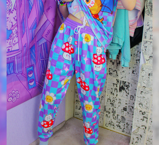 Model dressed in colorful Decora Kei and Kidcore fashion with vibrant pants.