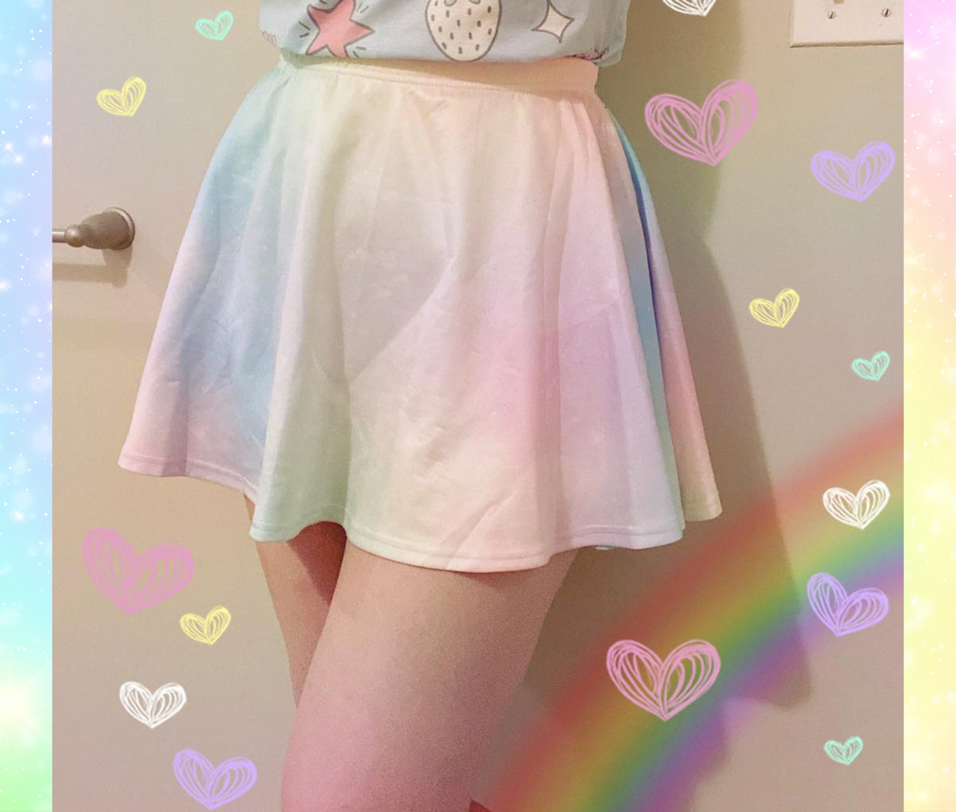 Young girl wearing a pastel kawaii skirt with rainbow print