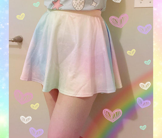 Young girl wearing a pastel kawaii skirt with rainbow print
