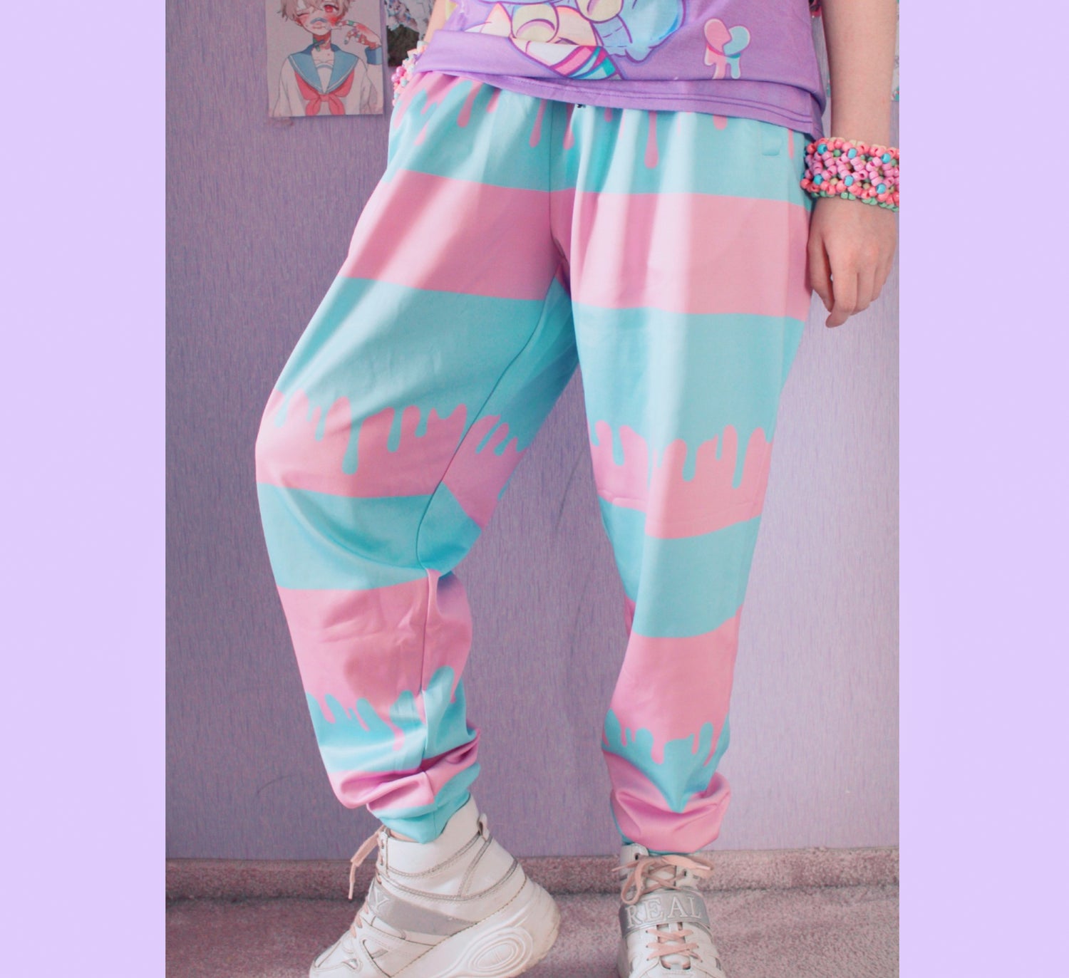 model wearing Kawaii Pastel Unisex Cute and Creepy Jogger pants