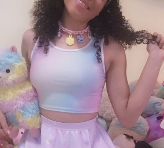Teen girl in a Kawaii Pocky Pink Rainbow Crop Top  with soft colors 