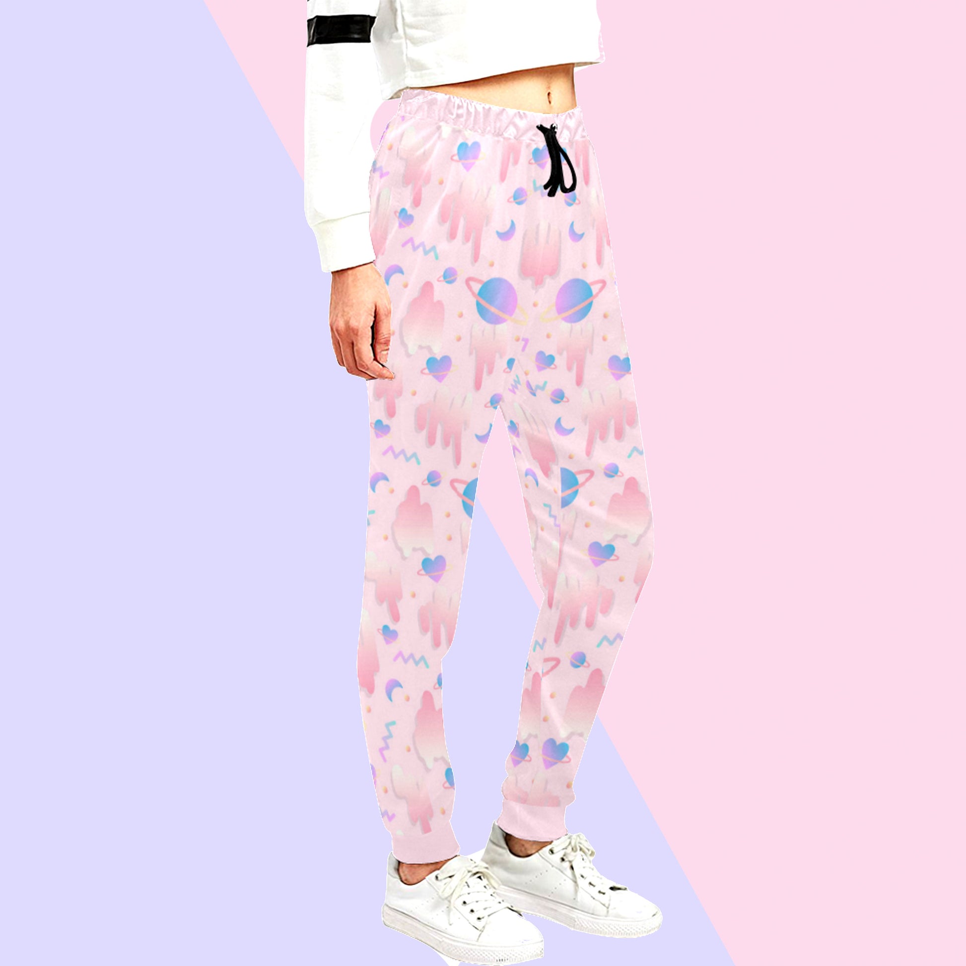 Pink pastel jogger displayed on pastel background.