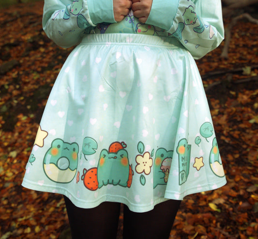 Happy girl dressed in a kawaii skirt styled with a pastel skirt, standing in natural light