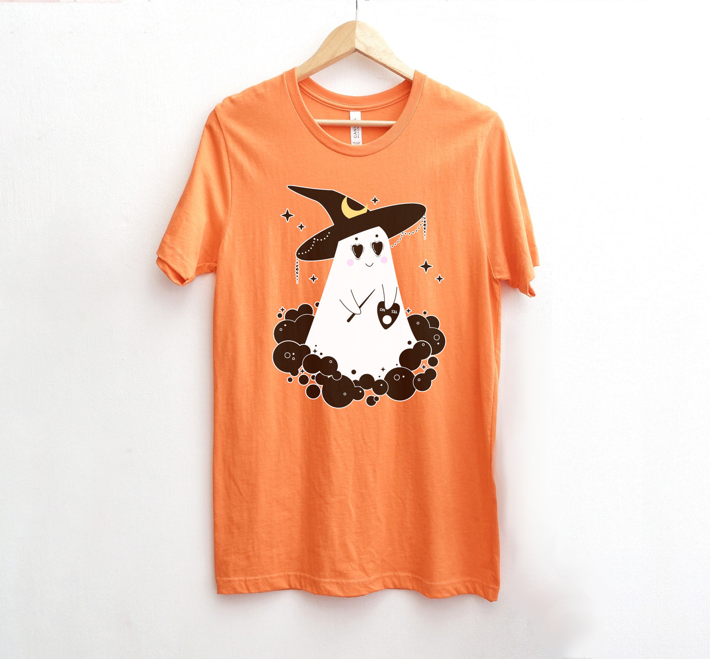 Cute Halloween ghost orange shirt displayed on clean white background.