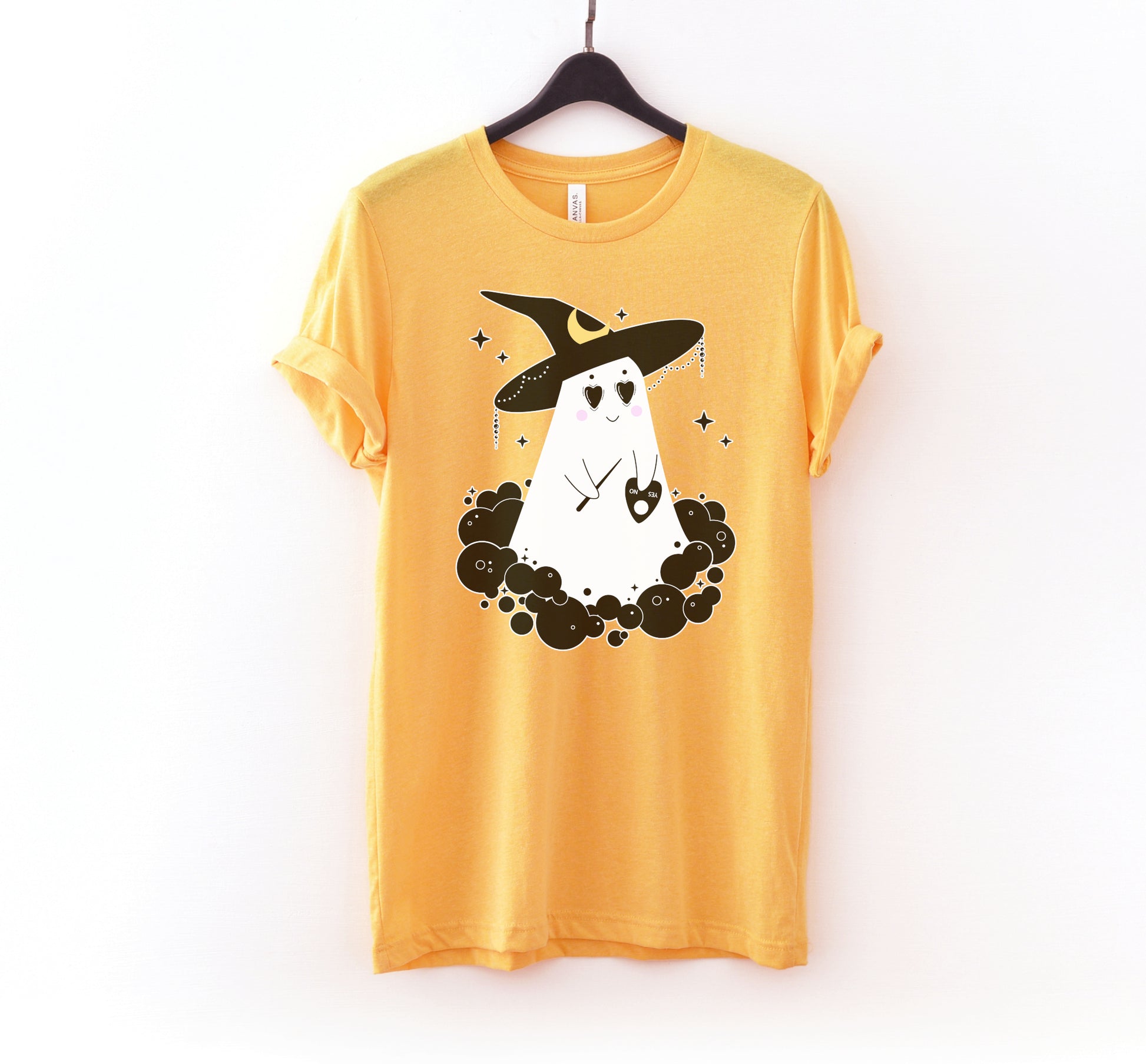 Cute Halloween ghost yellow shirt displayed on clean white background.