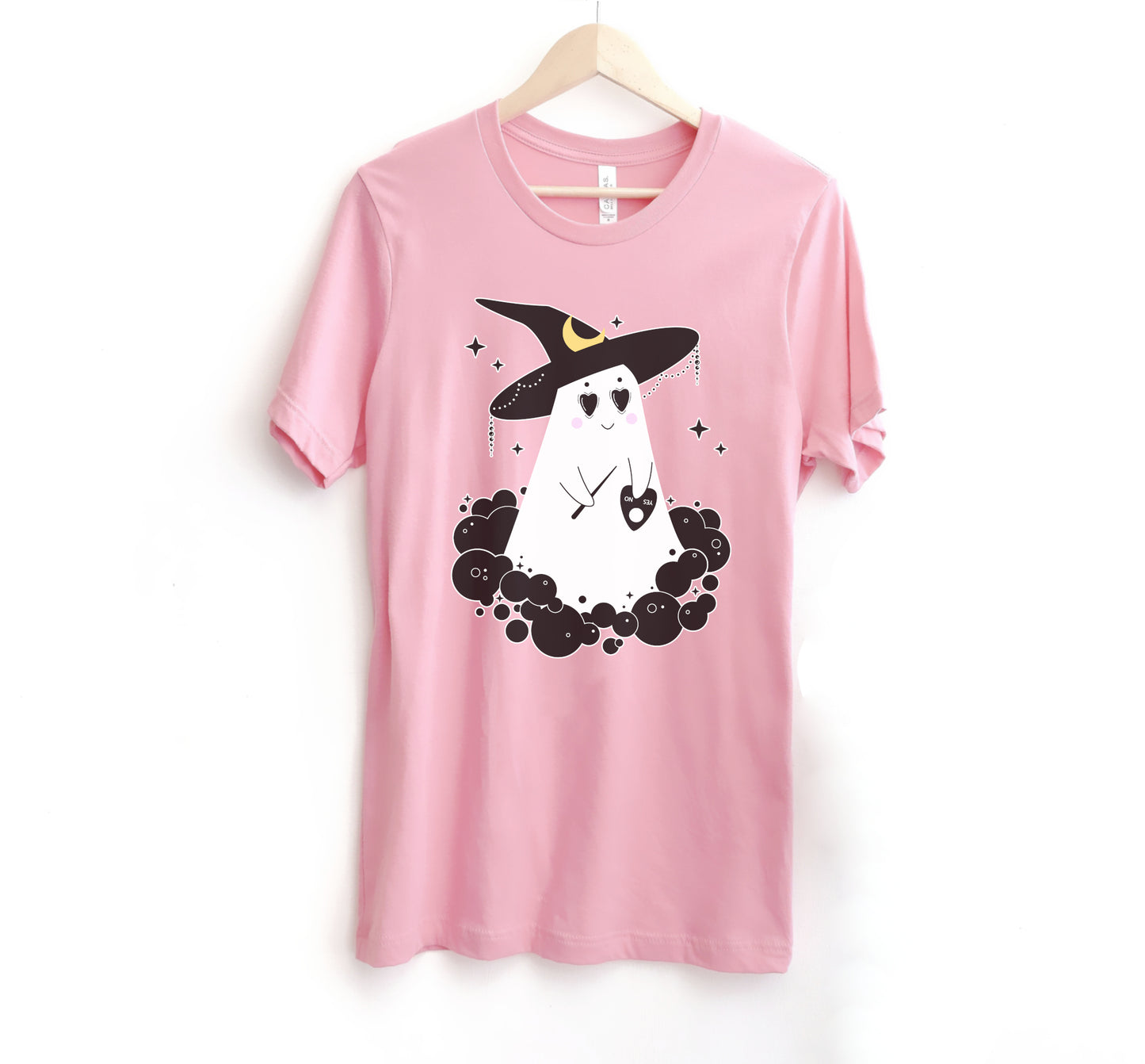 Cute Halloween ghost pink shirt displayed on clean white background.