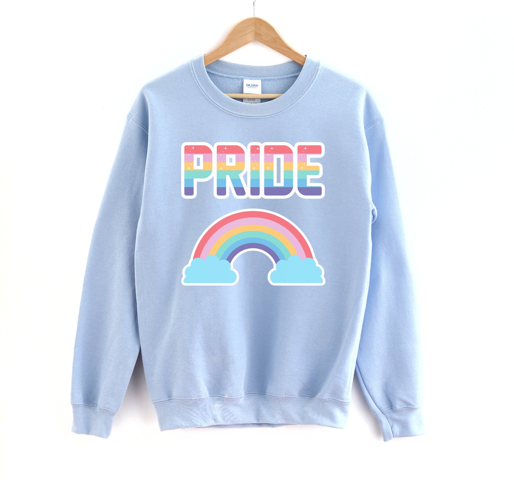 Blue  LGBT kawaii t-shirt with rainbow print on white background.