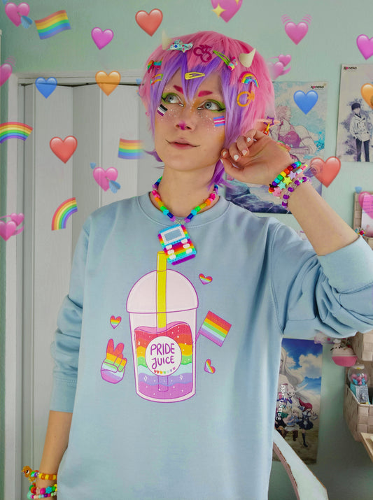 Young boy wearing a pastel kawaii pride t-shirt with a cute print
