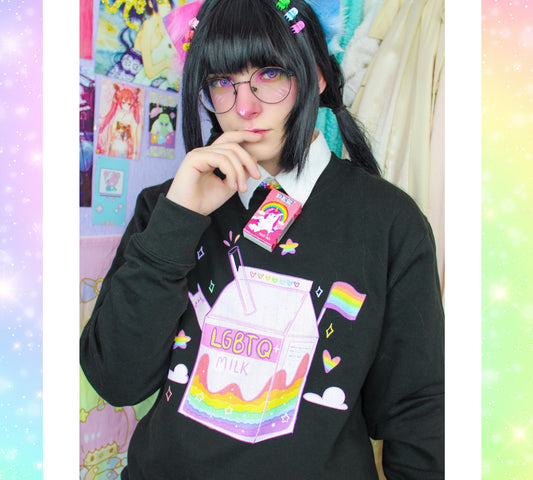 Young girl wearing a lgbtq milk sweatshirt 