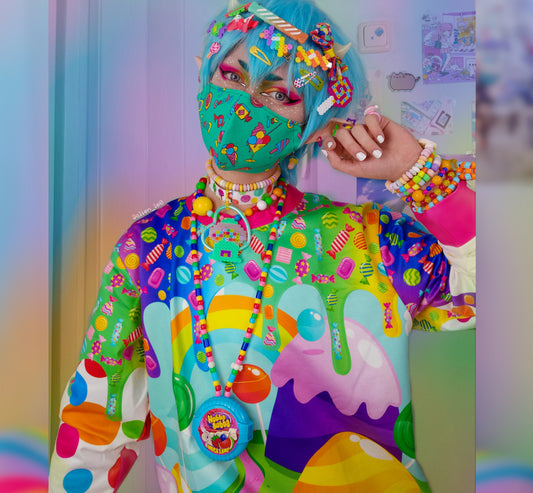 Young boy wearing a Harajuku Kidcore sweatshirt with a candy print