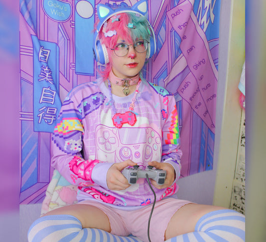 Model wearing a Harajuku Kidcore sweatshirt with videogame controller print