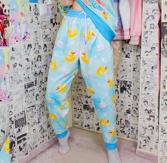 
Youth model wearing Pastel Goth Yami Kawaii Baby Duck Unisex Jogger Pants