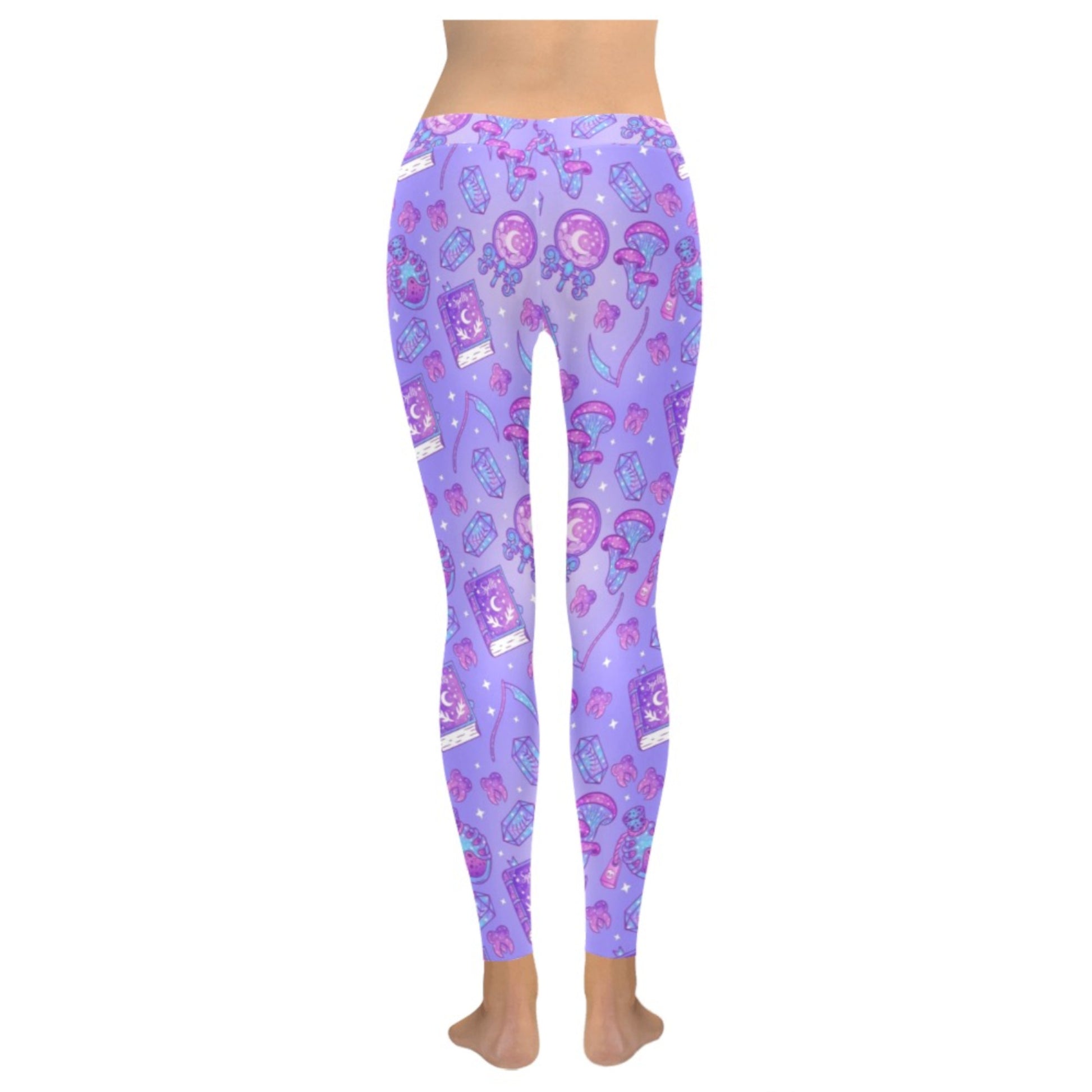 Yami kawaii Witchcraft purple leggings displayed on a clean background.
